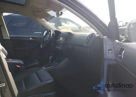 2014 Volkswagen Tiguan Sel z USA, uszkodzony, nr VIN WVGAV3AXXEW556304